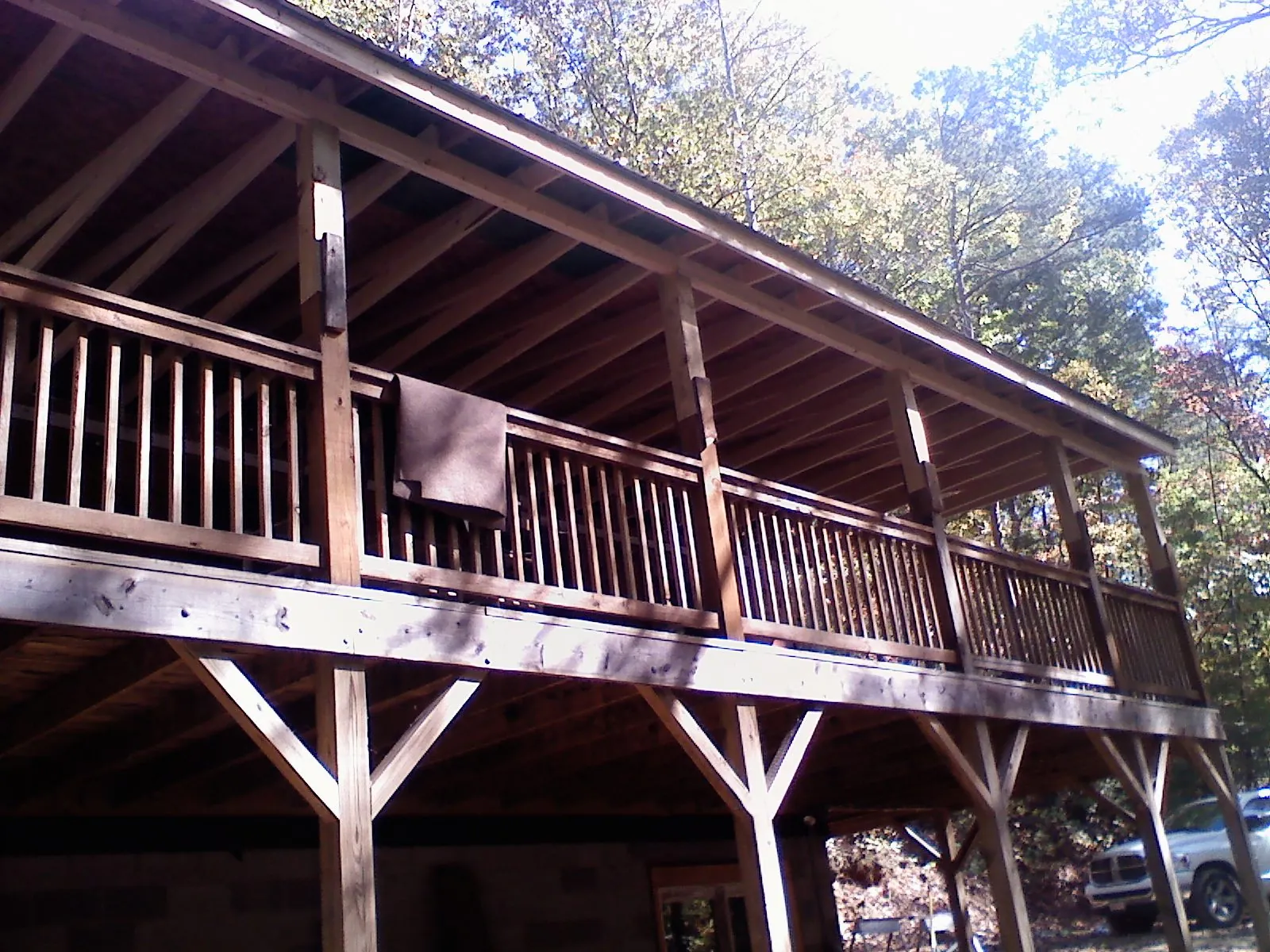 Timber framing under a new elevated porch and deck — Roof Leak Repair in Priest River by Roofing Brothers
